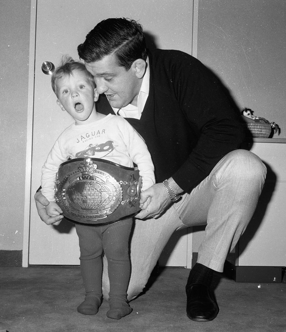 billy-robinson-with-son-spencer-and-belt