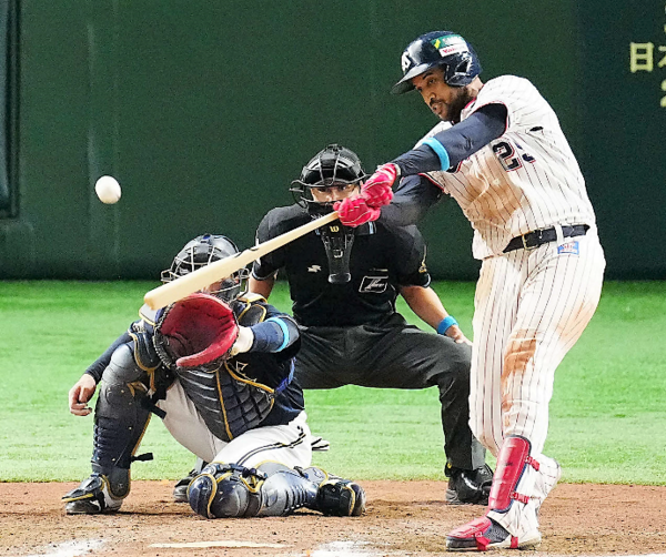 Baseball in Japan Adam Jones of the Orix Buffaloes hits a three-run home  run in